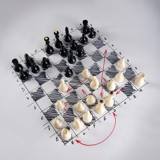 Chess game on handdrawn board with strategy