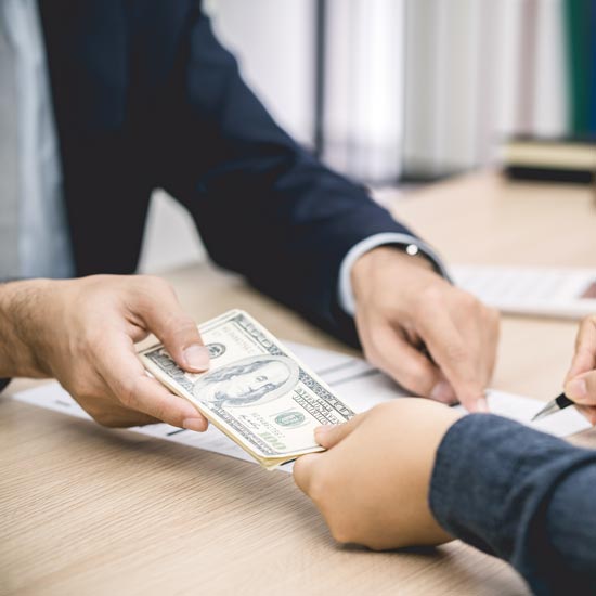 Person receiving money from banker