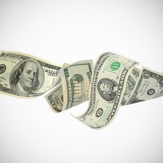 Flying money on white background